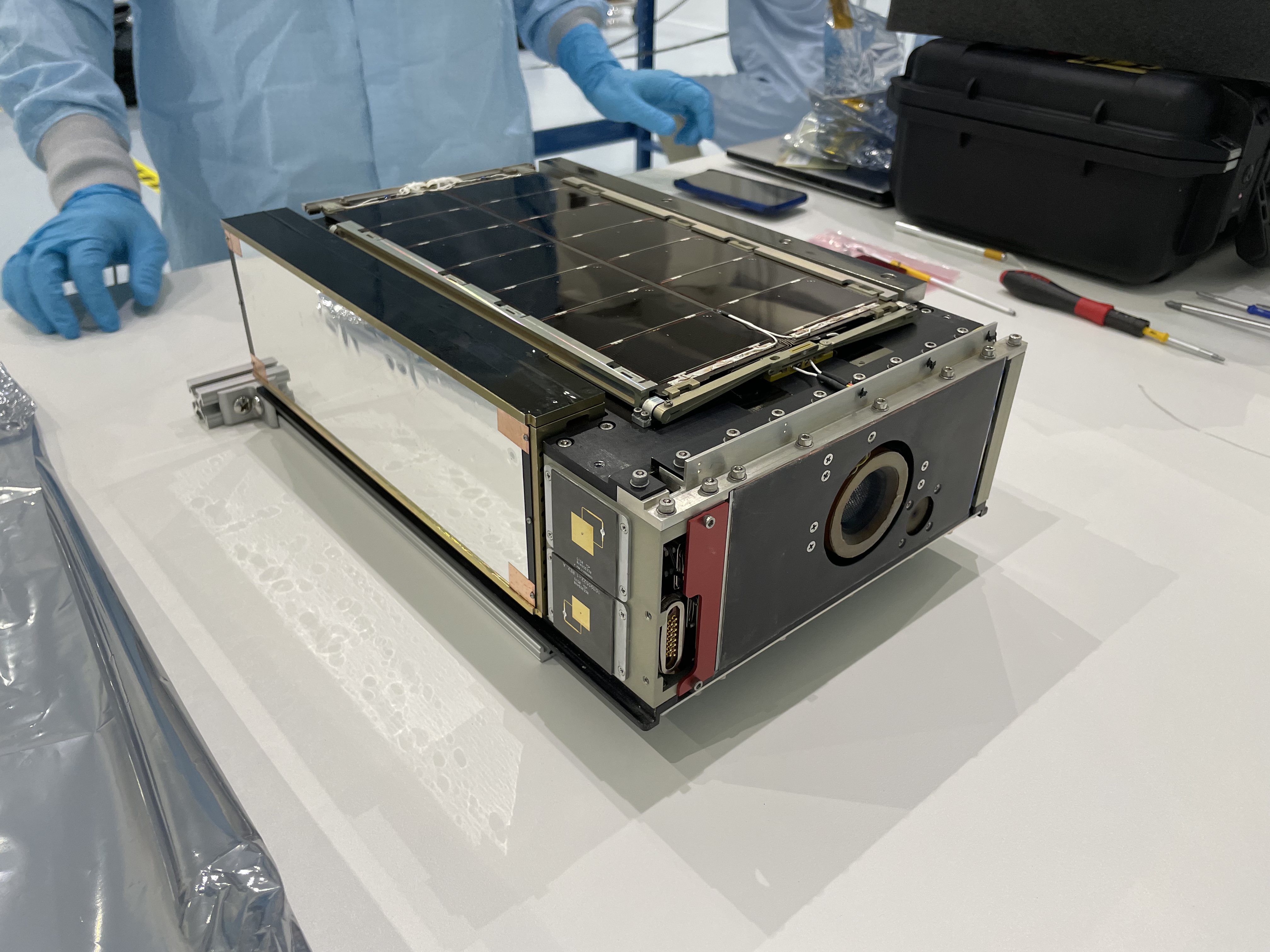 LunaH-Map CubeSat unpacked on a white table during delivery inspection at NASA KSC